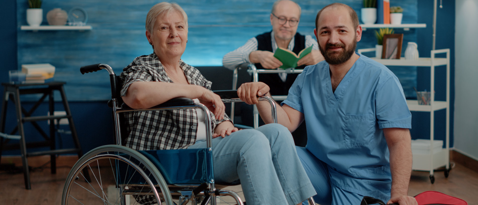 carer and senior woman in a wheelchair